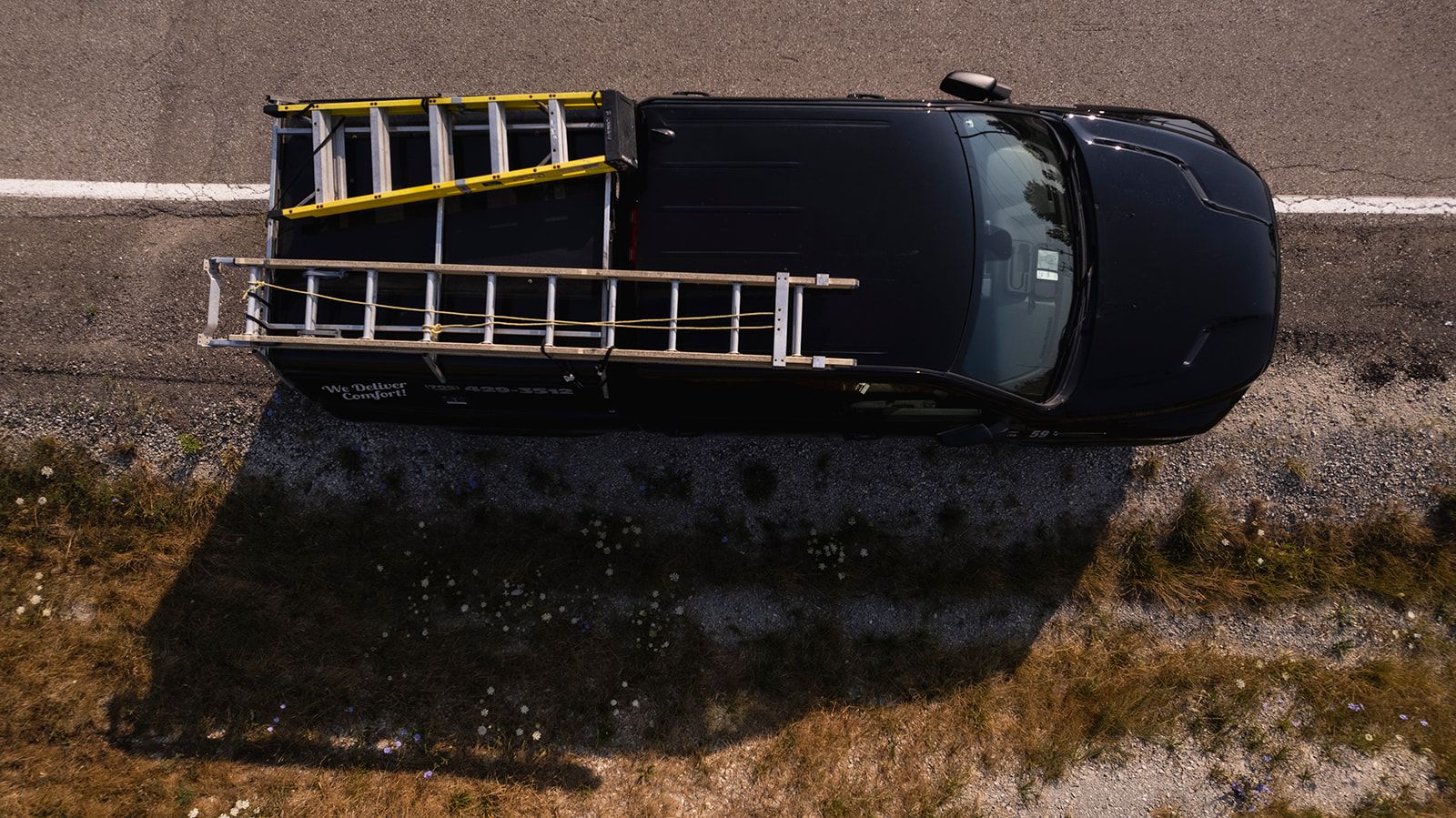 Nottawasaga service van from above with ladders on the roof